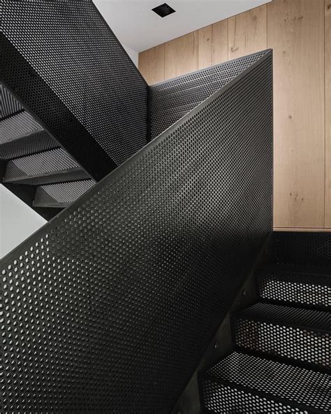 The perforated metal stair in our residential project 'Peter's House 